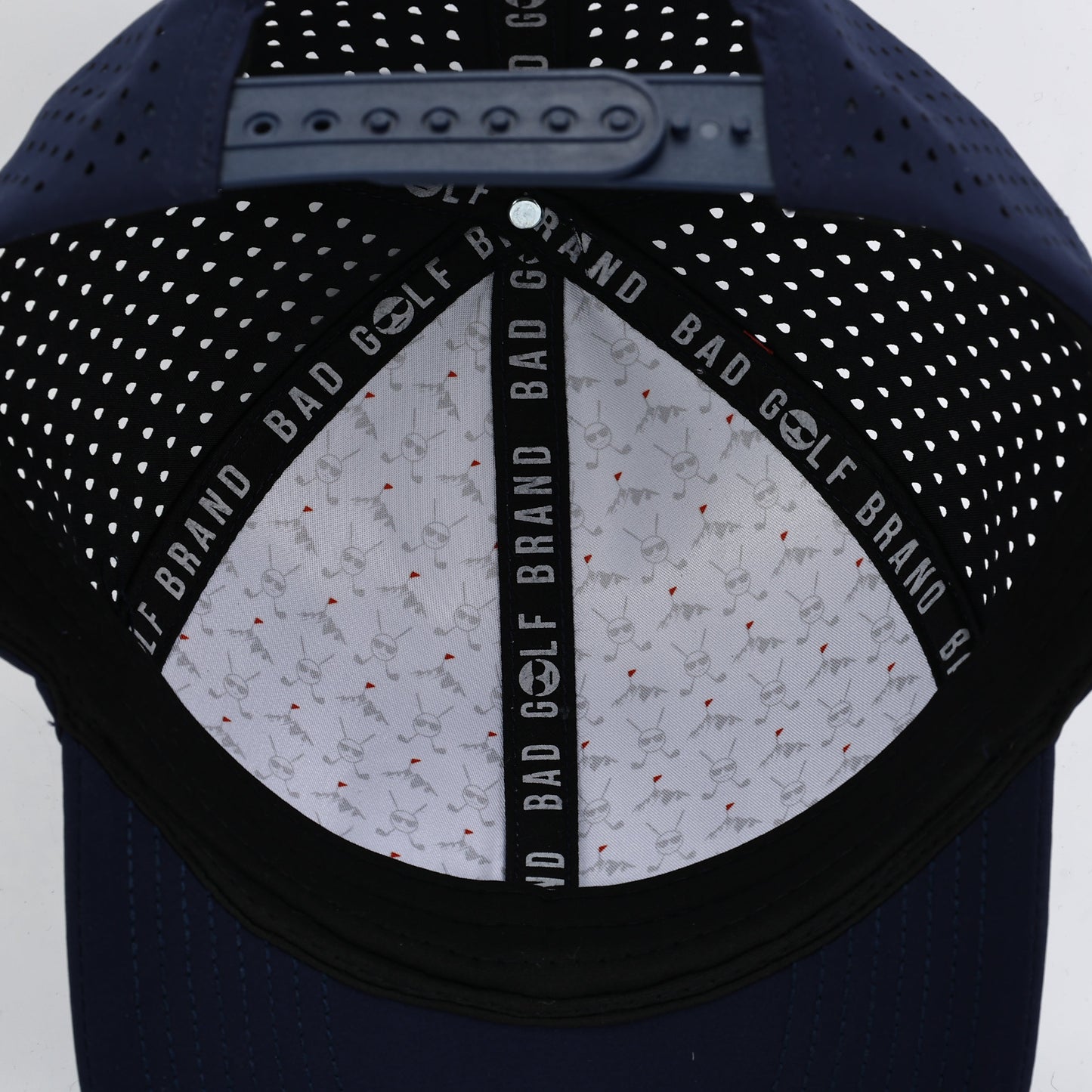 Navy blue cap with studded design and  branding on a white background. The Summit Collection by Bad Golf Brand